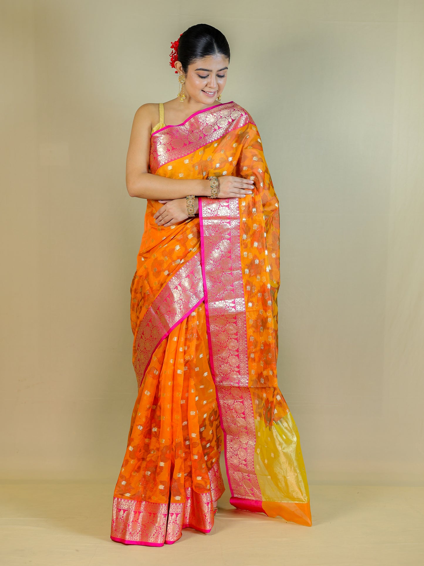 Orange Organza Saree with Pink Zari Border – Lightweight Party Wear Saree