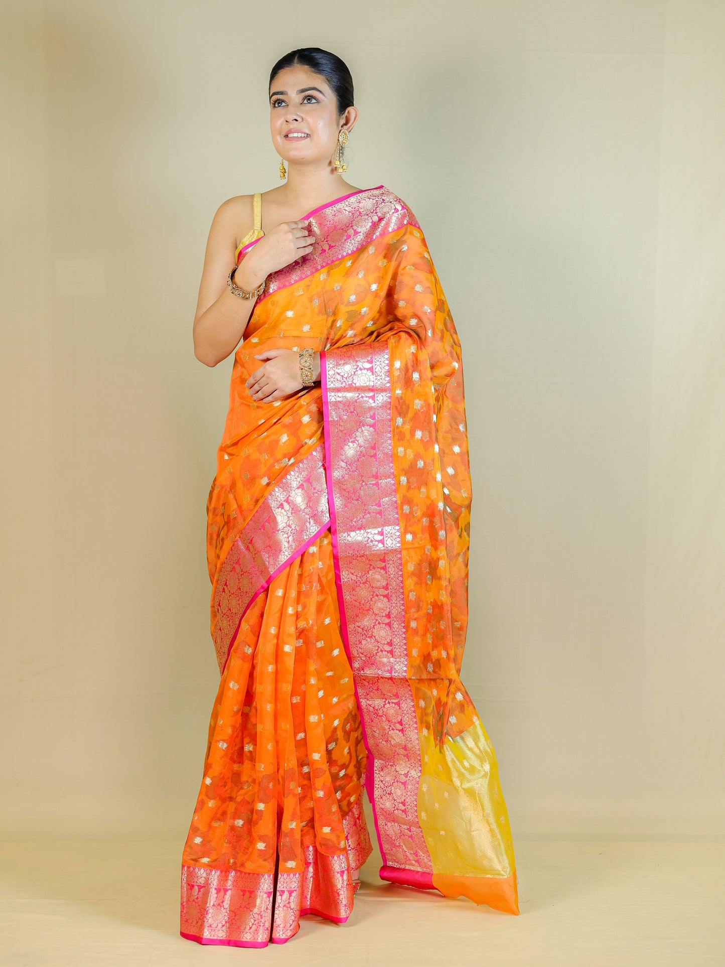 Orange Organza Saree with Pink Zari Border – Lightweight Party Wear Saree
