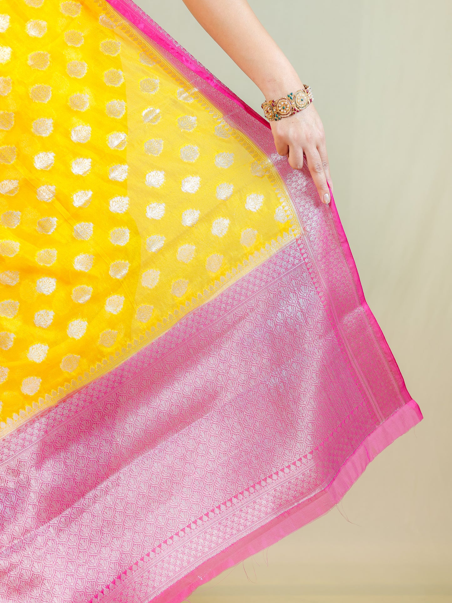 Yellow Silk Blend Saree with Pink Zari Border – Festive & Party Wear
