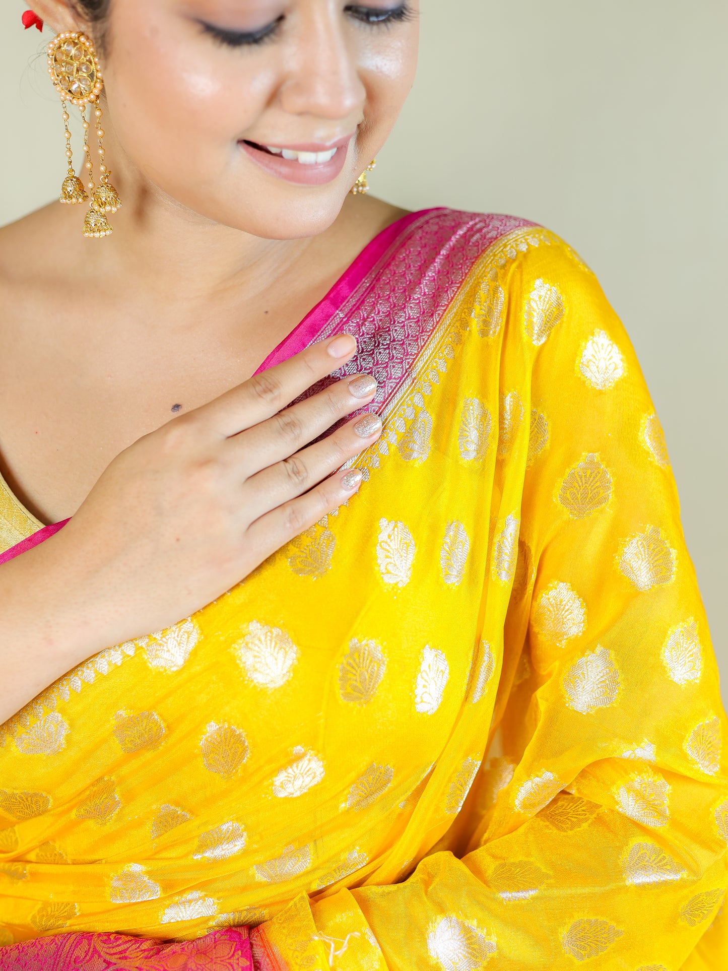 Yellow Silk Blend Saree with Pink Zari Border – Festive & Party Wear