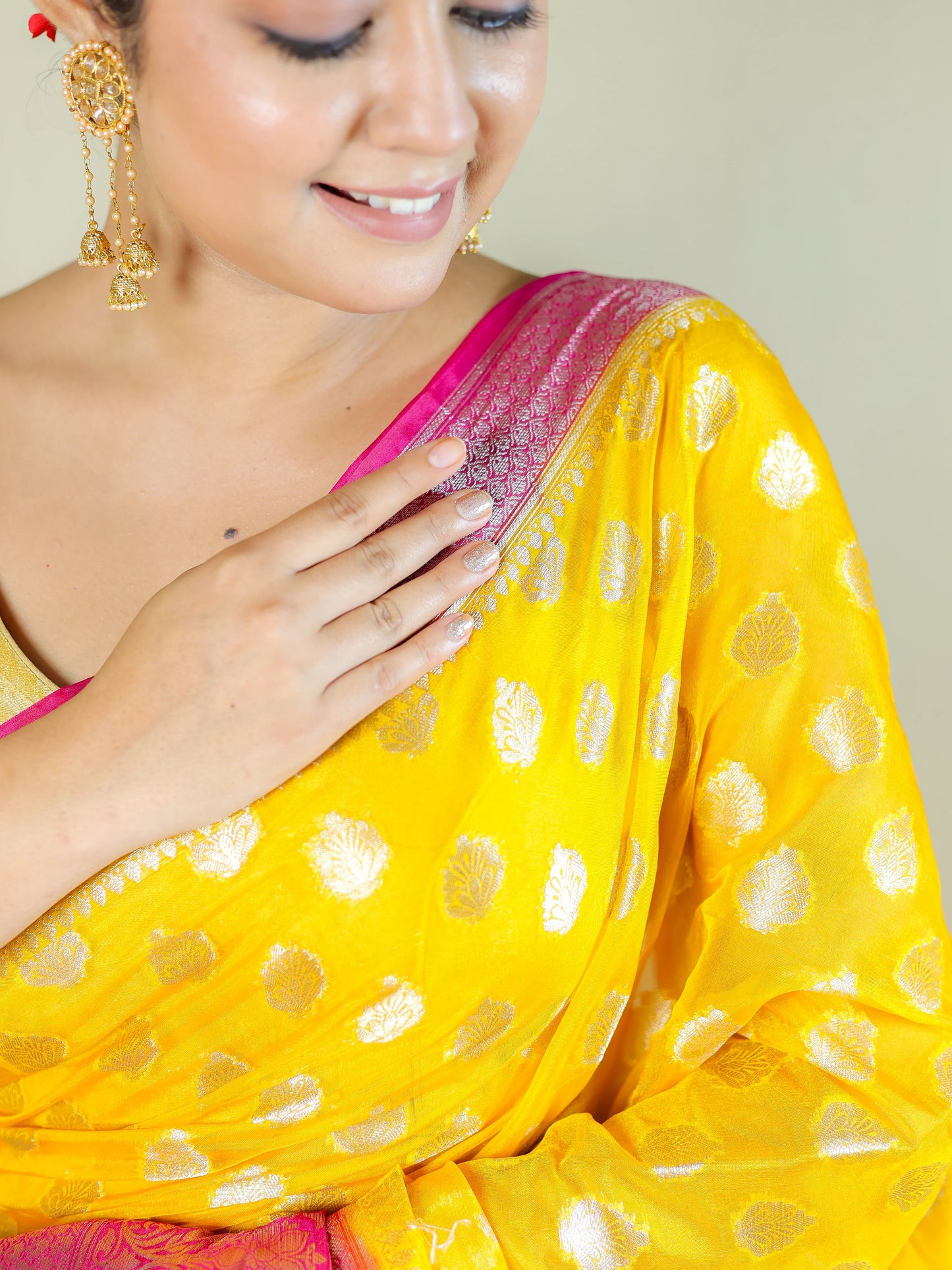 Yellow Silk Blend Saree with Pink Zari Border – Festive & Party Wear