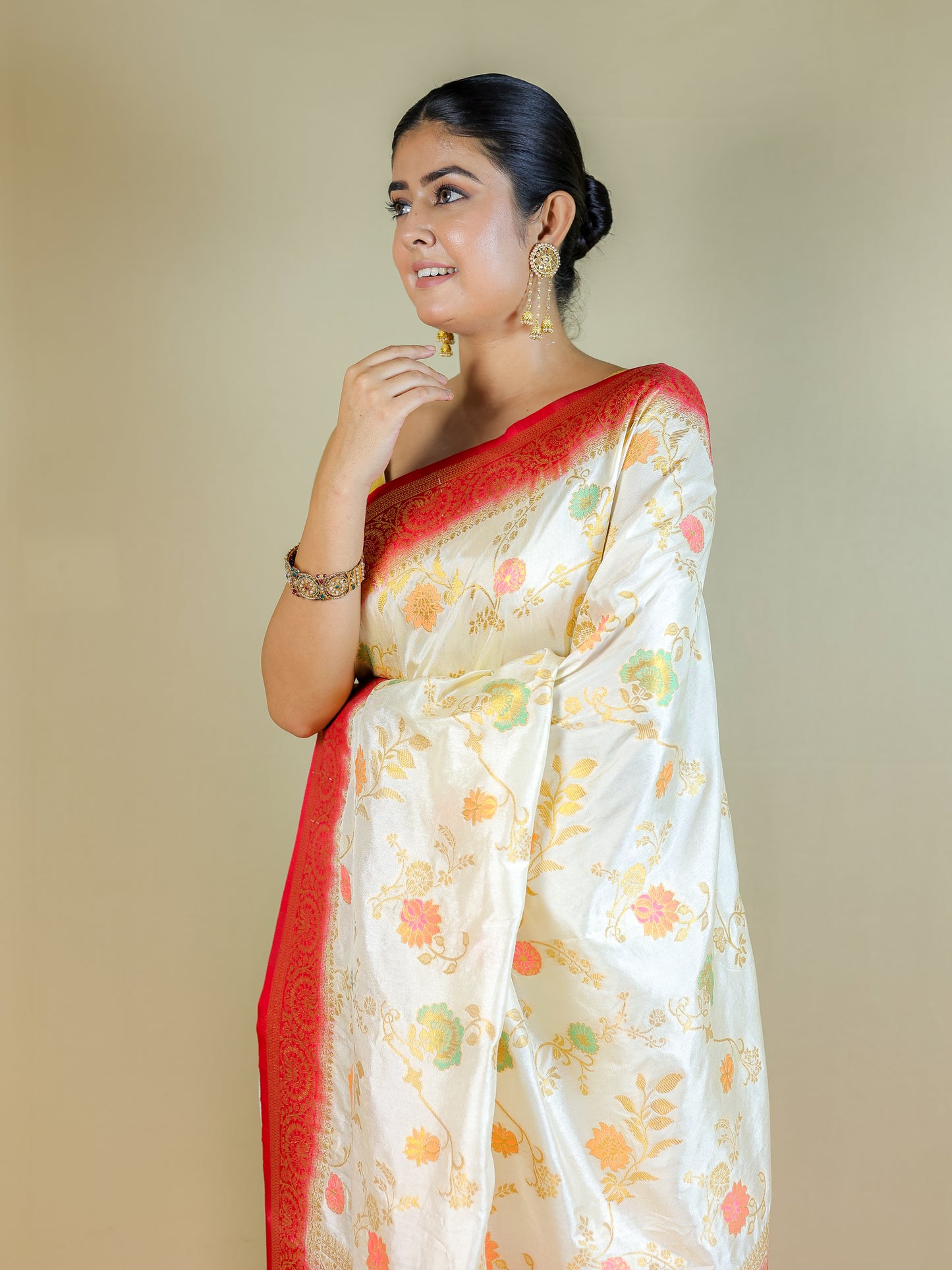 White Silk Blend Saree with Multicolor Floral Design & Red Zari Border – Festive Wear