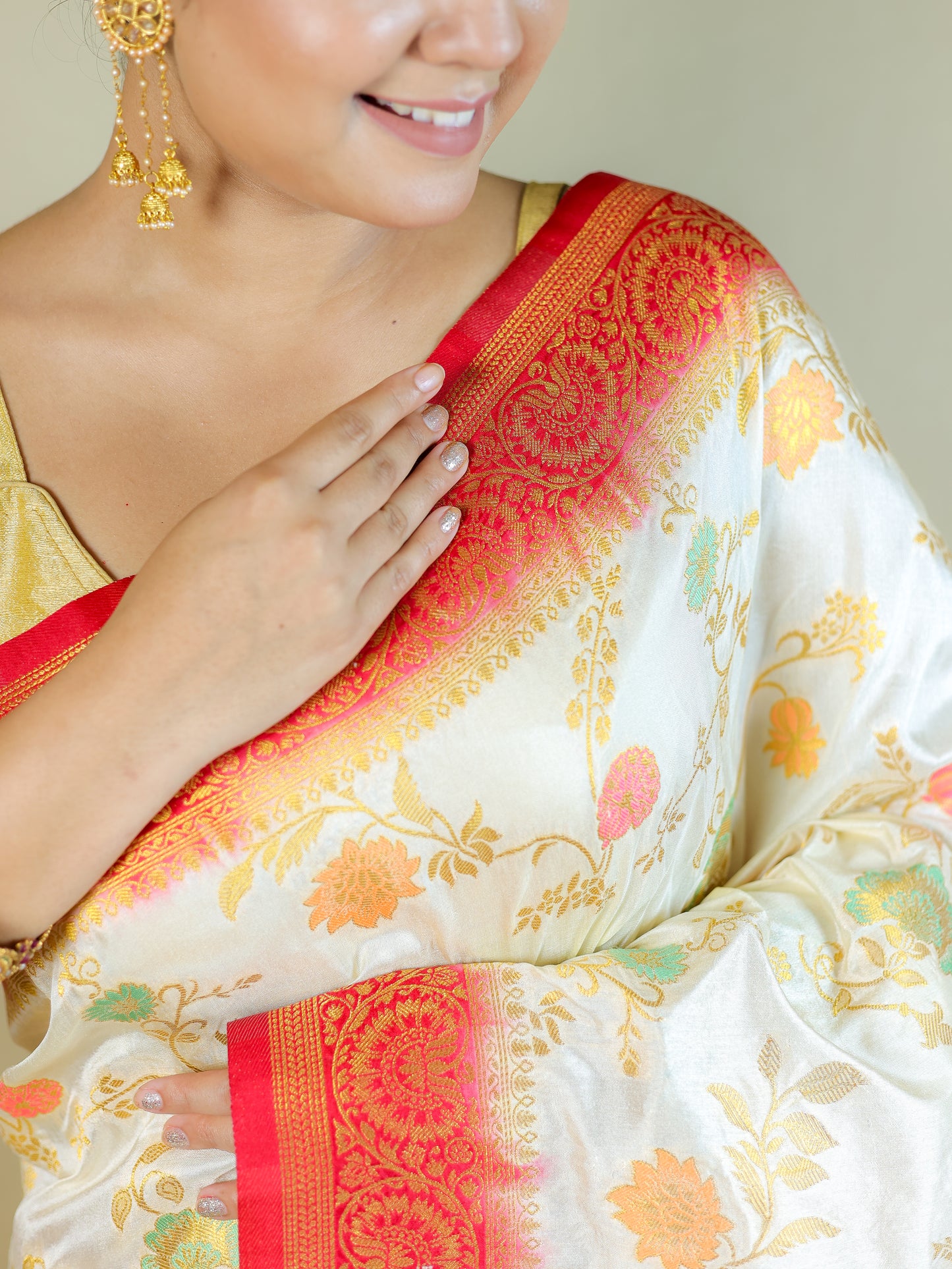White Silk Blend Saree with Multicolor Floral Design & Red Zari Border – Festive Wear