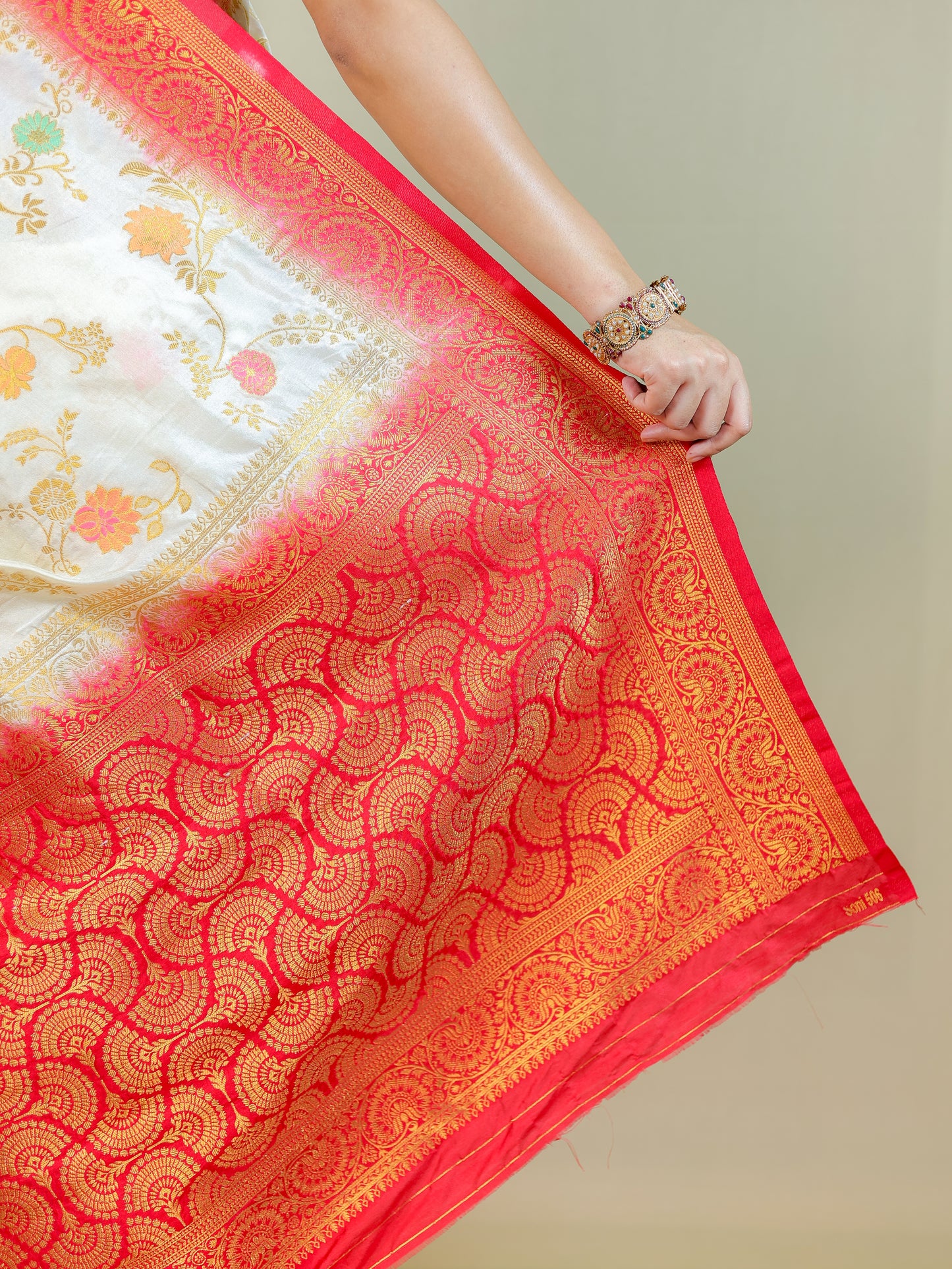 White Silk Blend Saree with Multicolor Floral Design & Red Zari Border – Festive Wear