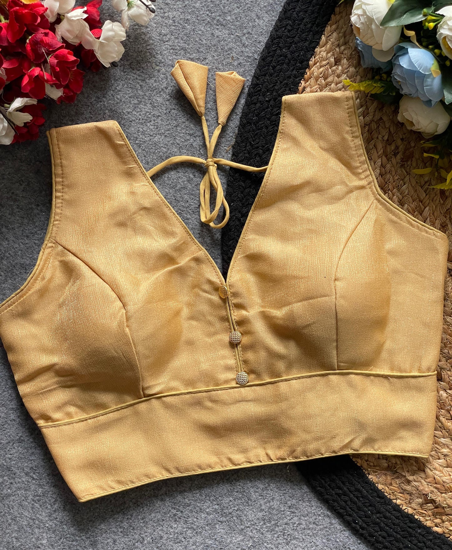 Readymade Sleeveless Blouse with Deep Neckline & Decorative Buttons