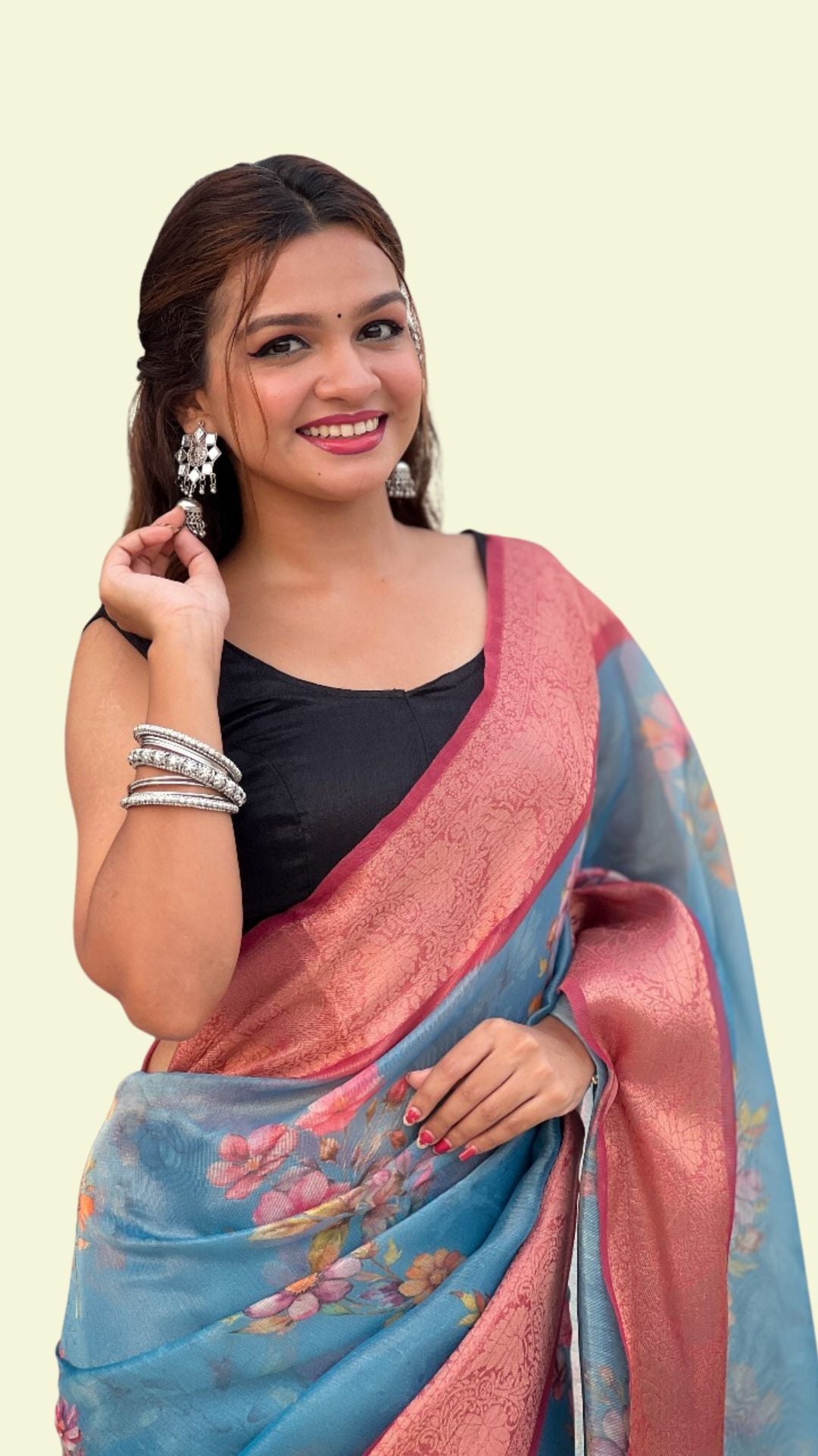 Sky Blue Floral Soft Tissue Saree with Peach Zari Border & Elegant Pallu