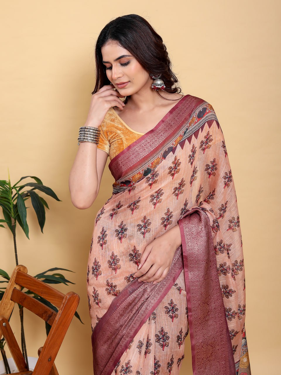 Elegant Peach Coral Floral Print Saree with Maroon Zari Border
