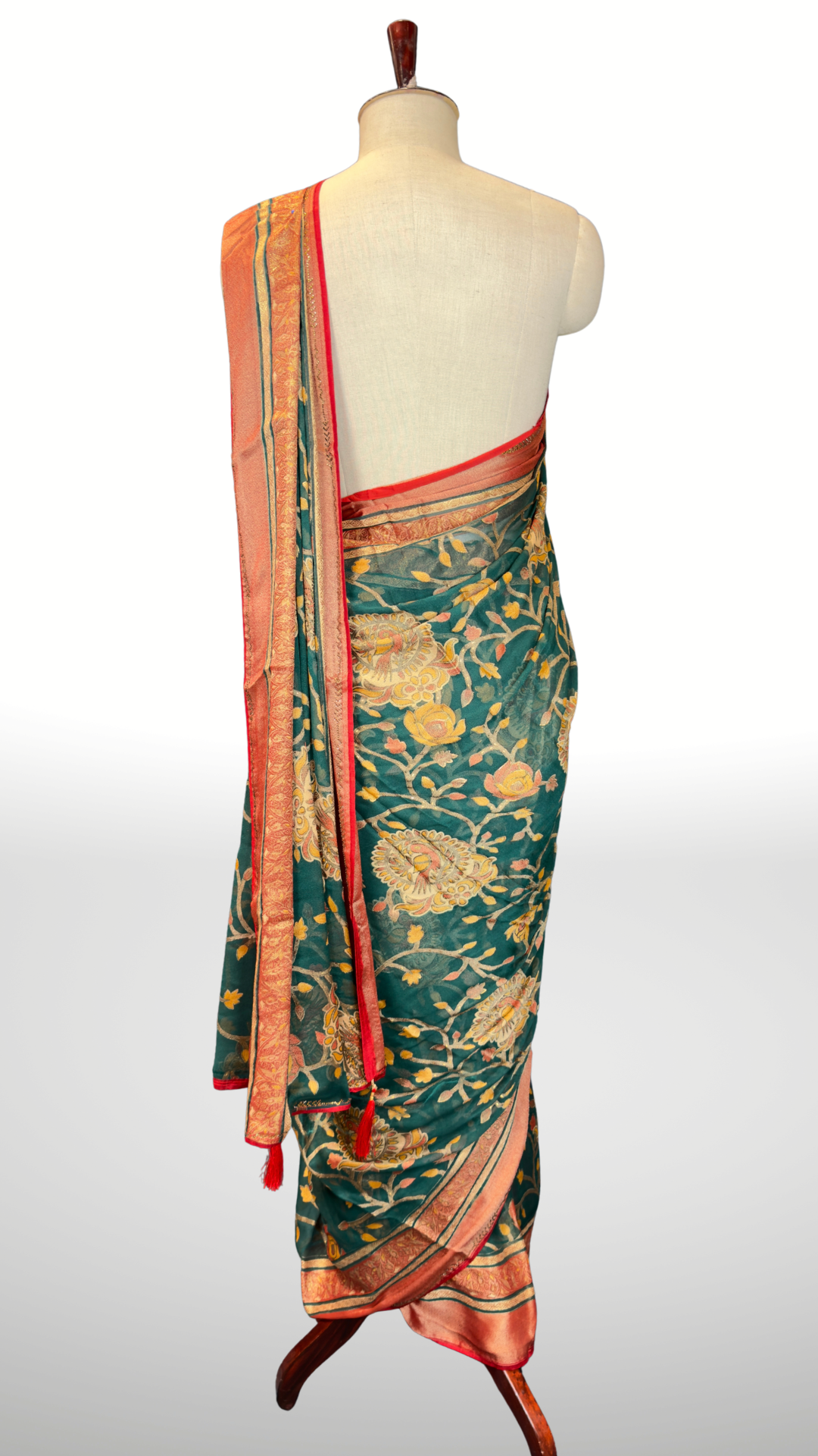 Banarashe Teal Green Floral Printed Georgette Saree with Peach & Gold Traditional Border