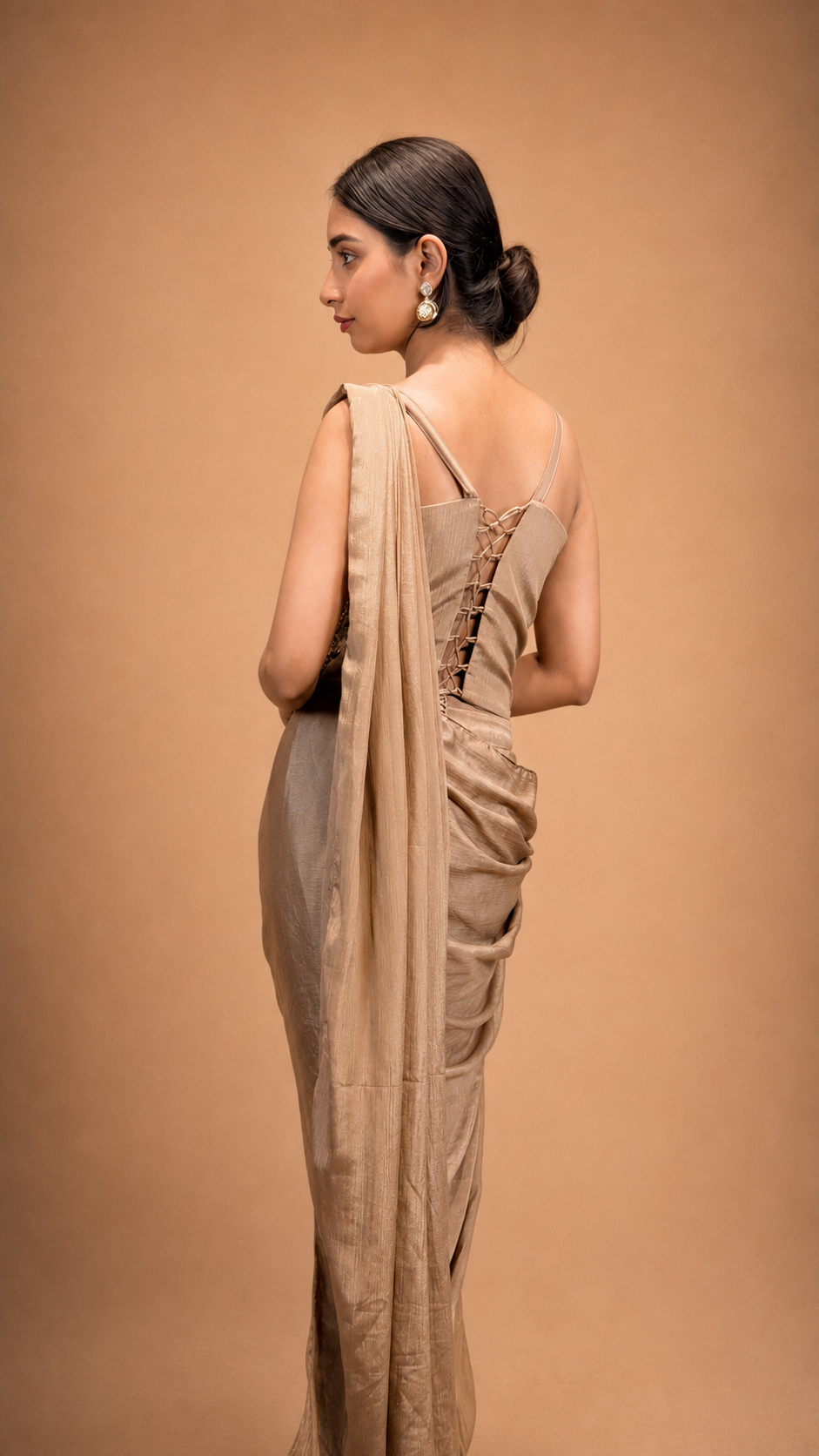 Champagne Drape Saree with Kundan Embellished Corset Blouse