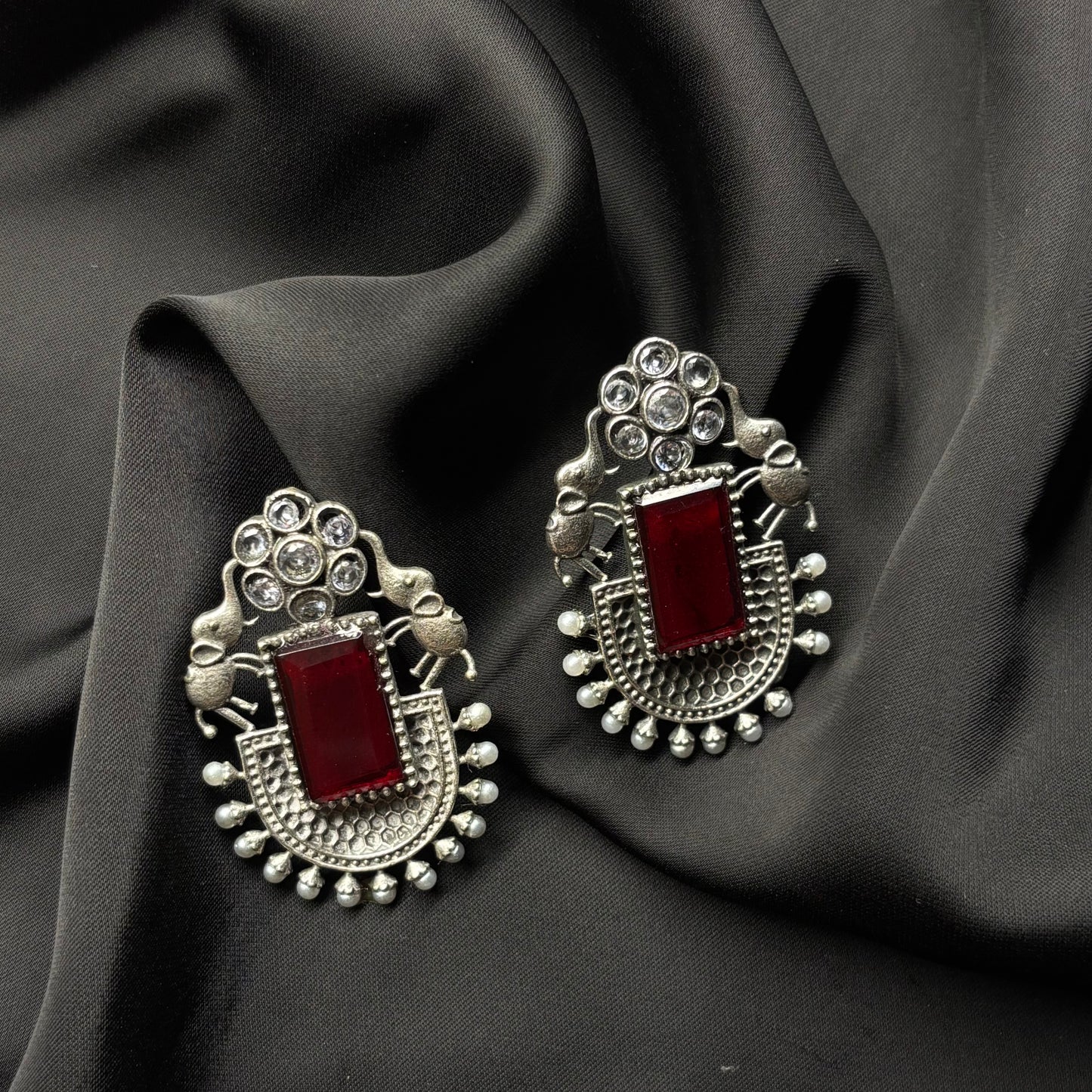 Oxidised German Silver Earrings with Dark Red Stone & Elephant Motif