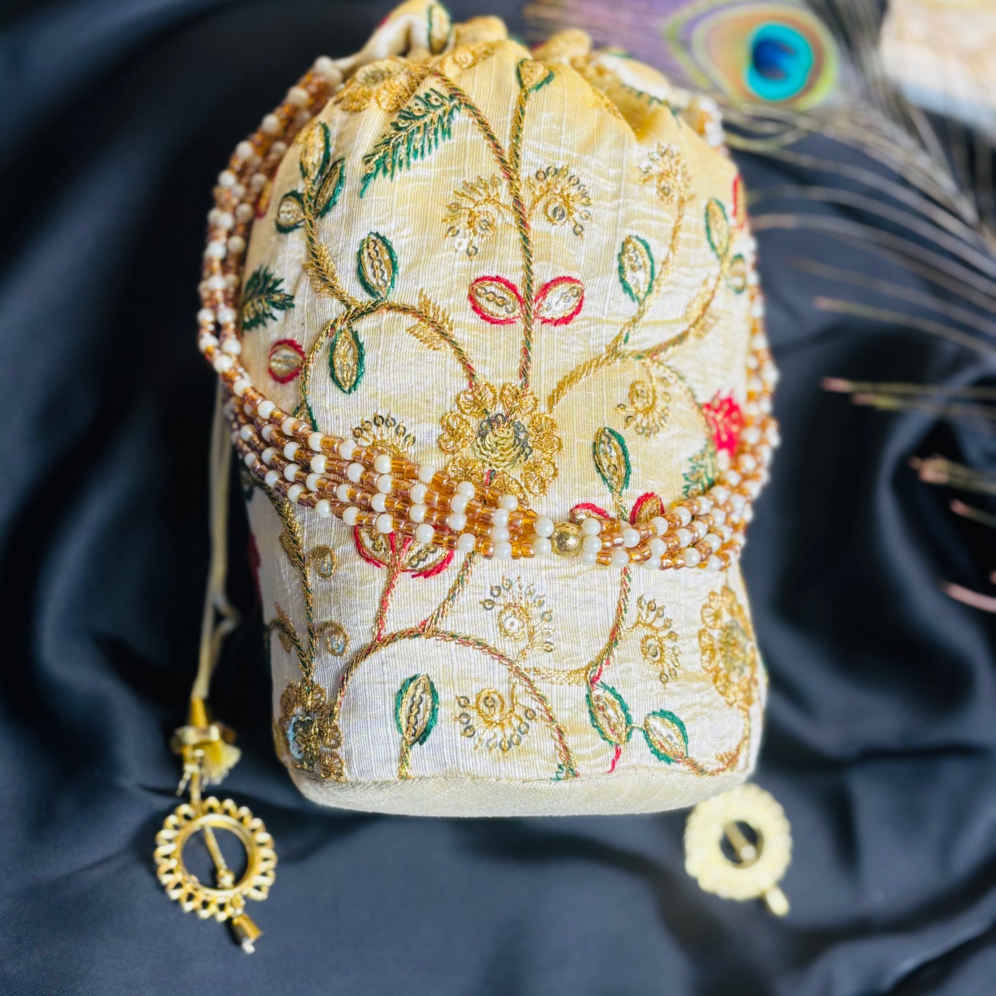 Ivory Zari Embroidered Potli with Multicolor Floral Work & Pearl Handle