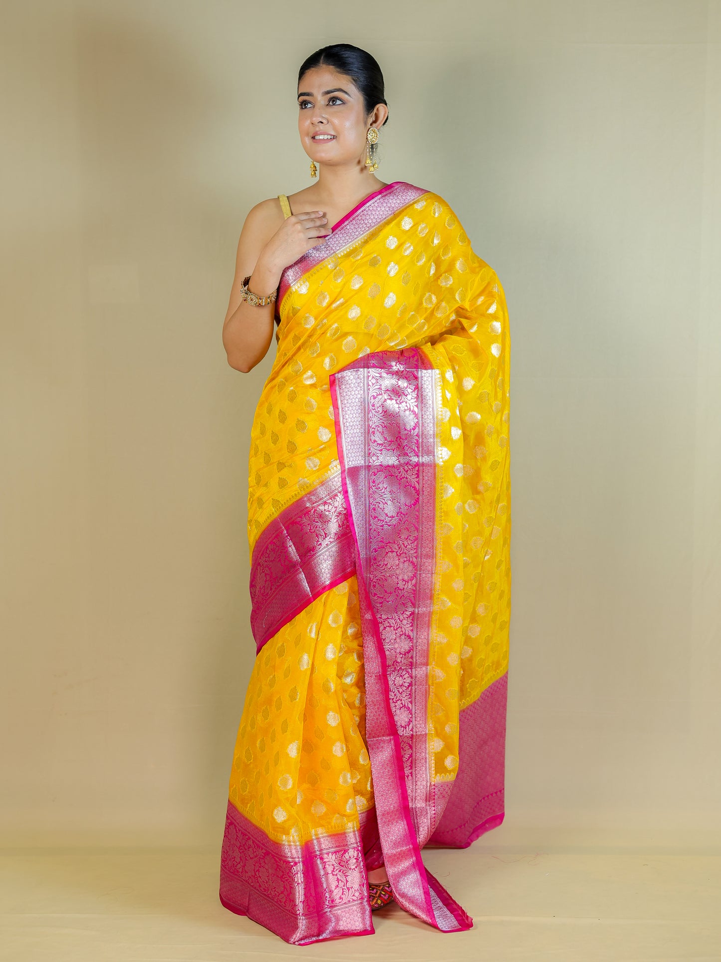 Yellow Silk Blend Saree with Pink Zari Border – Festive & Party Wear