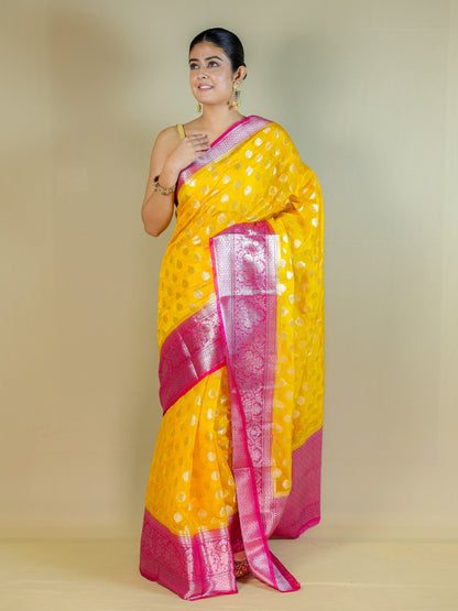 Yellow Silk Blend Saree with Pink Zari Border – Festive & Party Wear