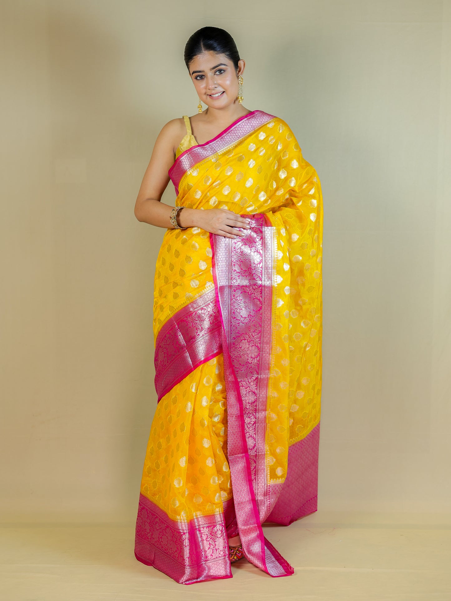 Yellow Silk Blend Saree with Pink Zari Border – Festive & Party Wear