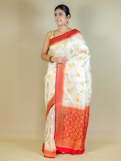 White Silk Blend Saree with Multicolor Floral Design & Red Zari Border – Festive Wear