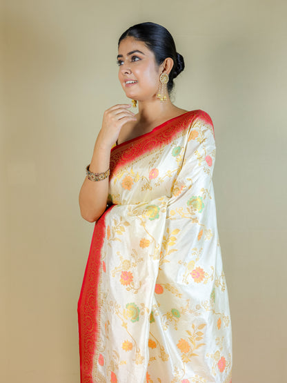 White Silk Blend Saree with Multicolor Floral Design & Red Zari Border – Festive Wear