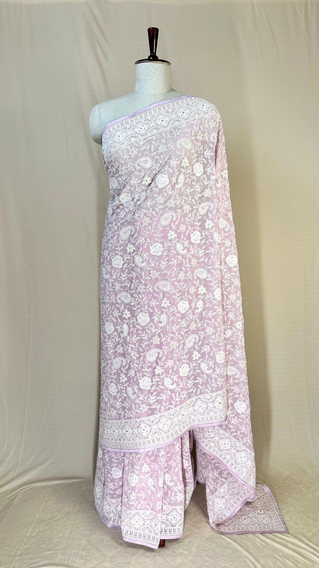 Elegant baby pink chikankari Saree with White Floral Embroidery,