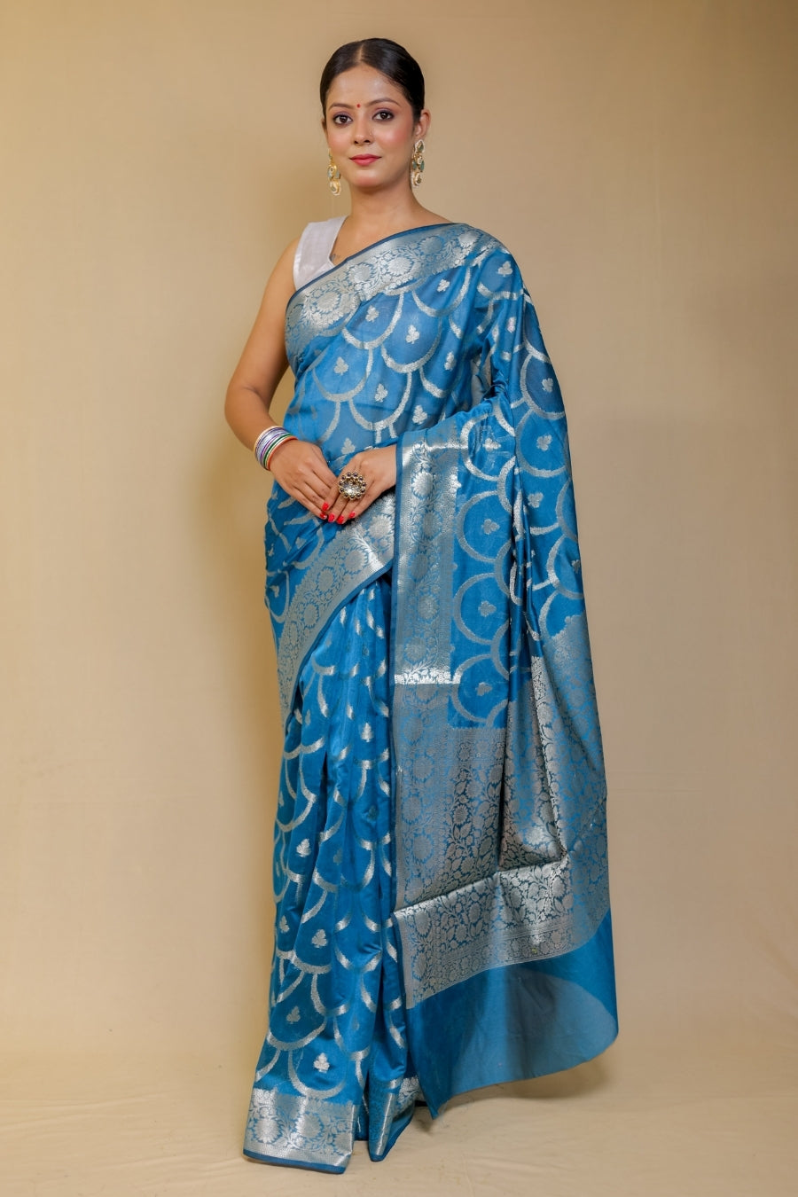 Banarasi Elegance Teal Blue Mercerised Mul Georgette Silk Saree