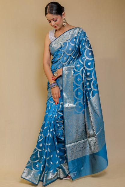 Banarasi Elegance Teal Blue Mercerised Mul Georgette Silk Saree