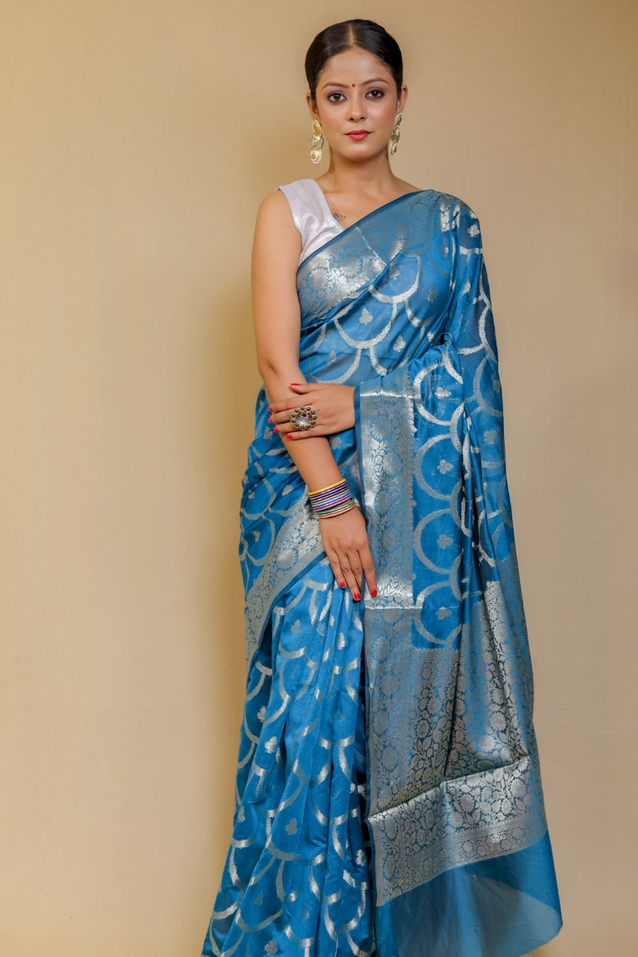 Banarasi Elegance Teal Blue Mercerised Mul Georgette Silk Saree