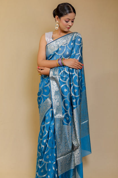 Banarasi Elegance Teal Blue Mercerised Mul Georgette Silk Saree