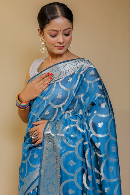 Banarasi Elegance Teal Blue Mercerised Mul Georgette Silk Saree