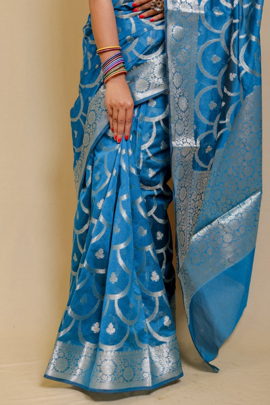Banarasi Elegance Teal Blue Mercerised Mul Georgette Silk Saree