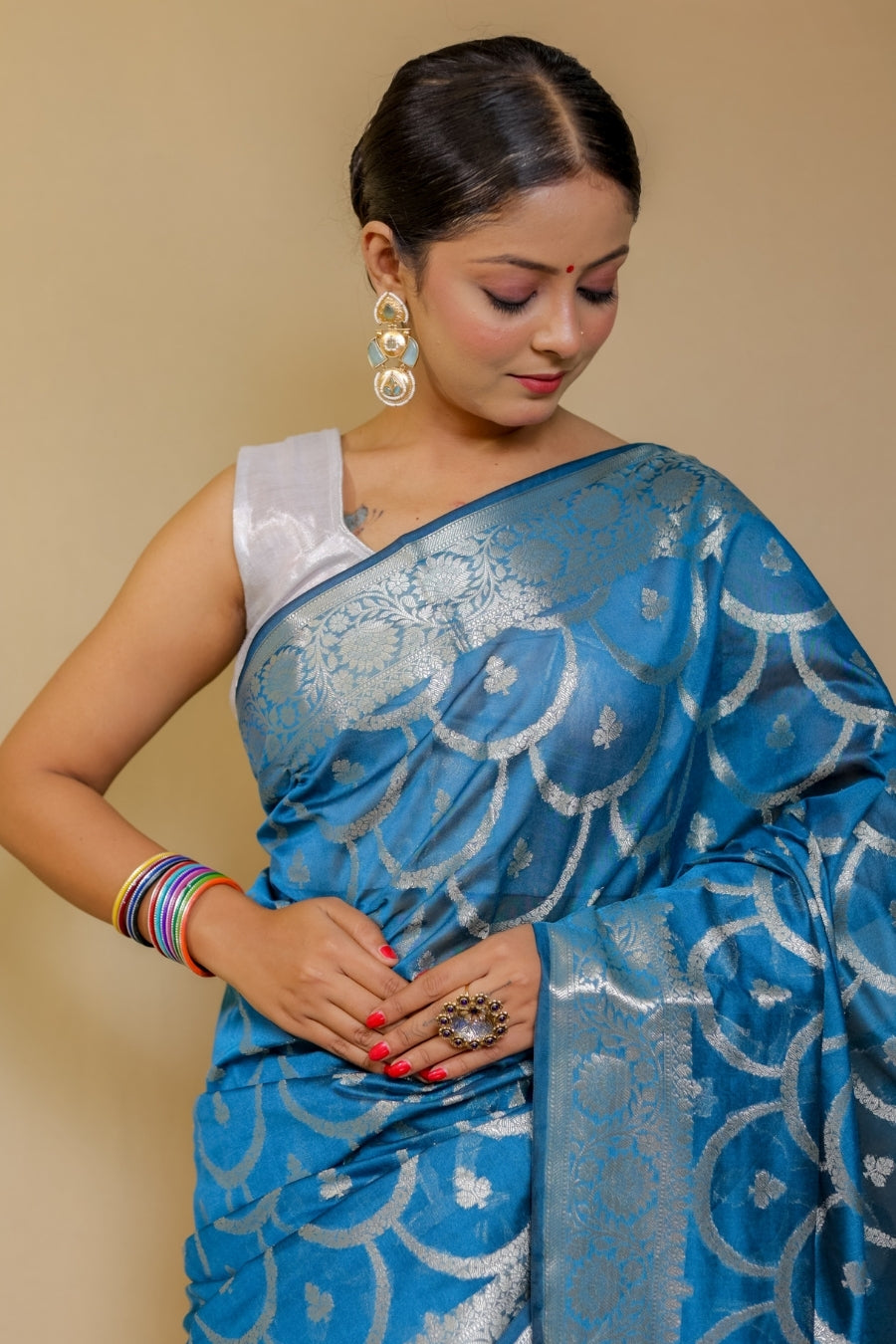 Banarasi Elegance Teal Blue Mercerised Mul Georgette Silk Saree