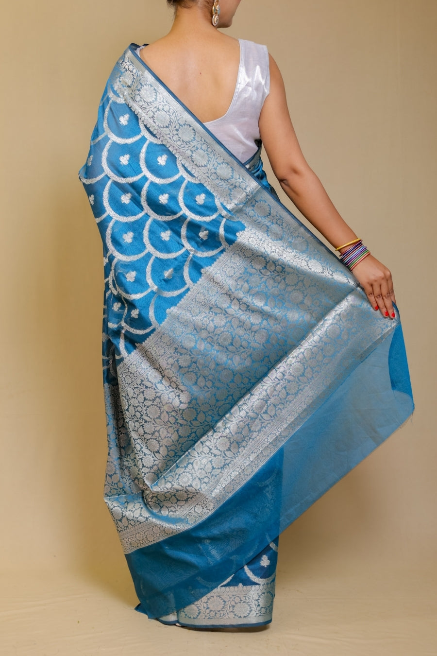Banarasi Elegance Teal Blue Mercerised Mul Georgette Silk Saree