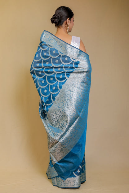Banarasi Elegance Teal Blue Mercerised Mul Georgette Silk Saree
