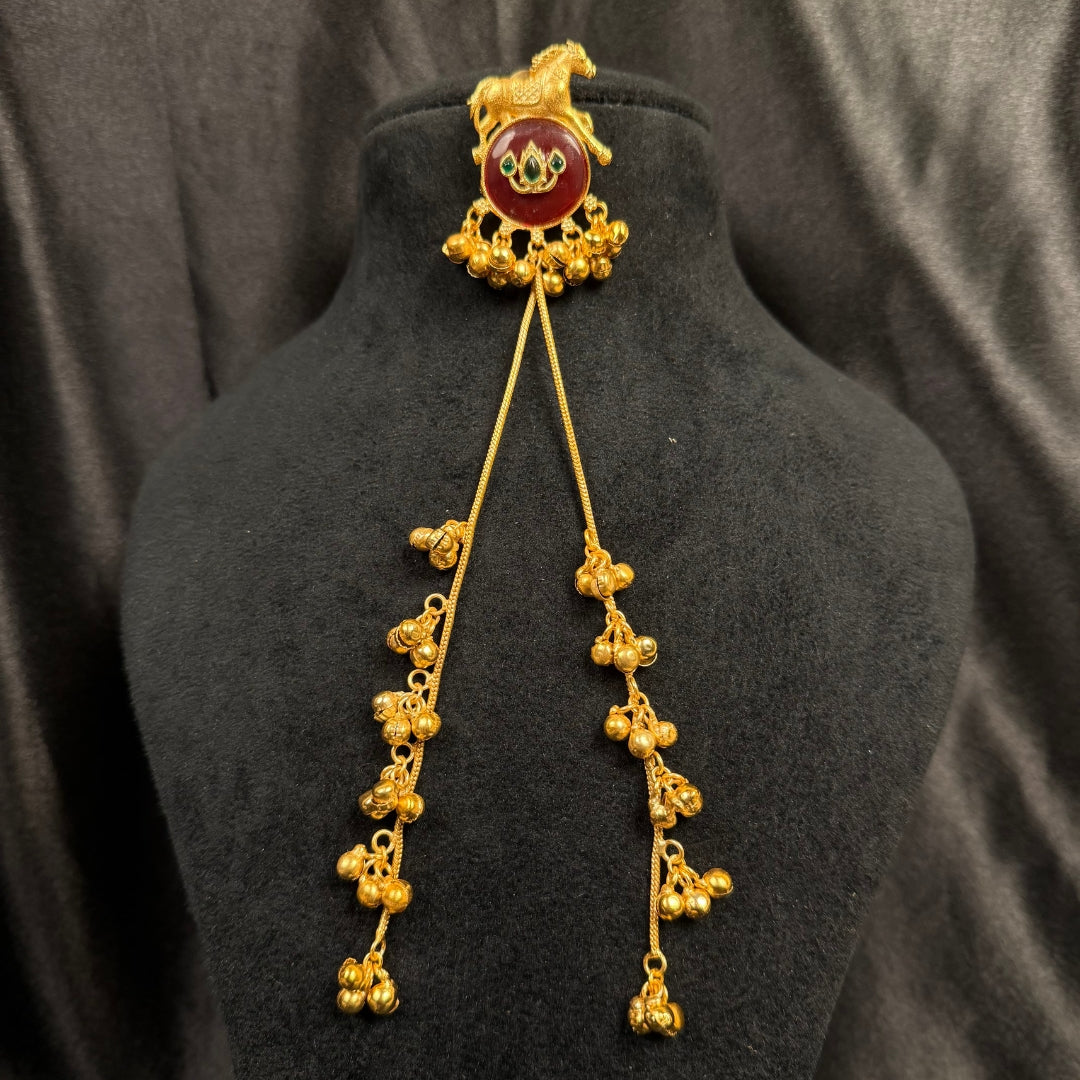 Traditional Gold Tone Horse Motif Earrings with Maroon Stone