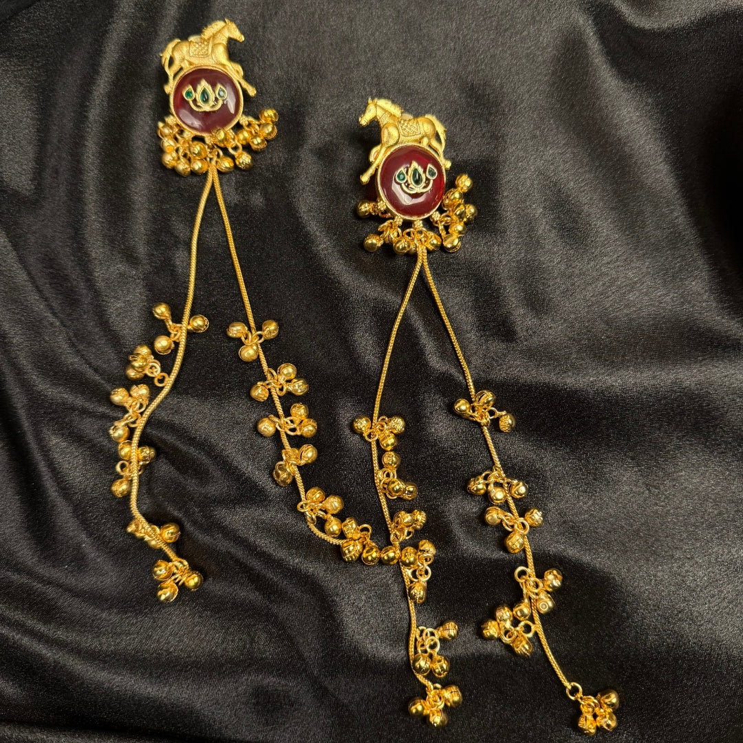 Traditional Gold Tone Horse Motif Earrings with Maroon Stone