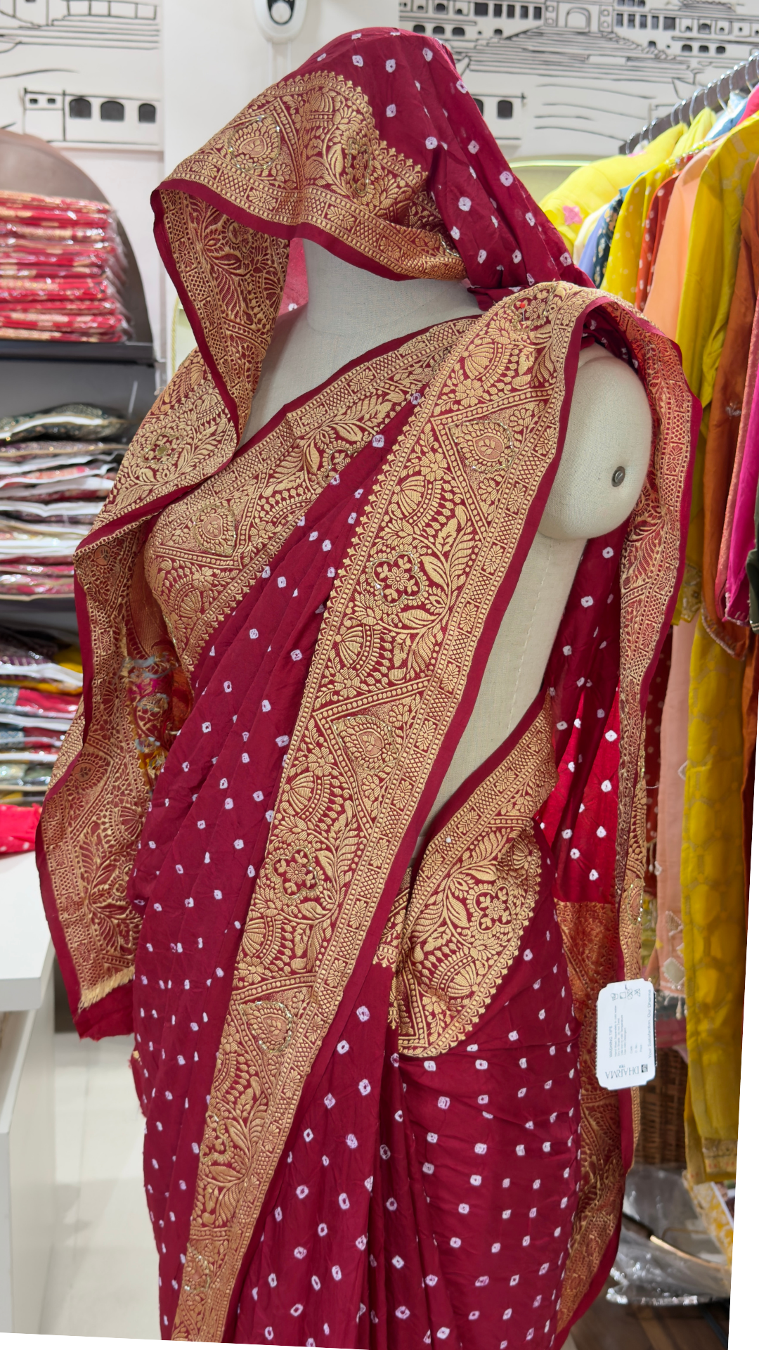 Designer Maroon Dola Silk Saree with Golden Zari Work & Bandhani Motifs – Printed Blouse Included