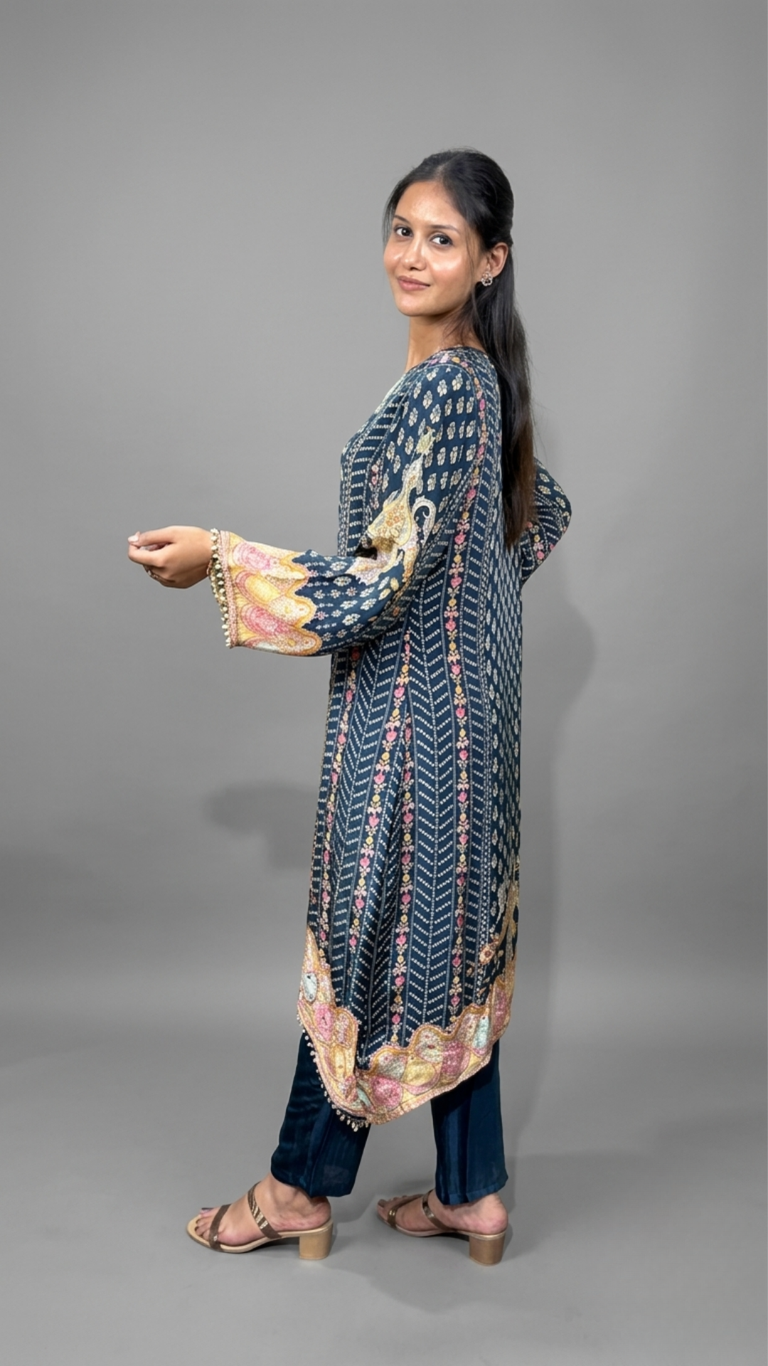 Navy Blue Embroidered High-Low Kurta Set with Tassel Detailing by BanaraShe