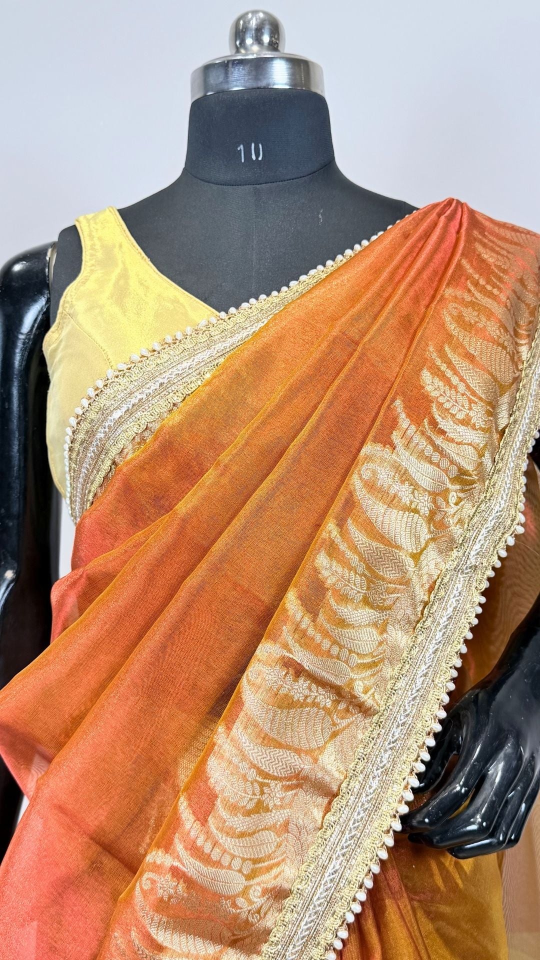 Orange Tissue Saree with Rich Zari Border & Moti Lace