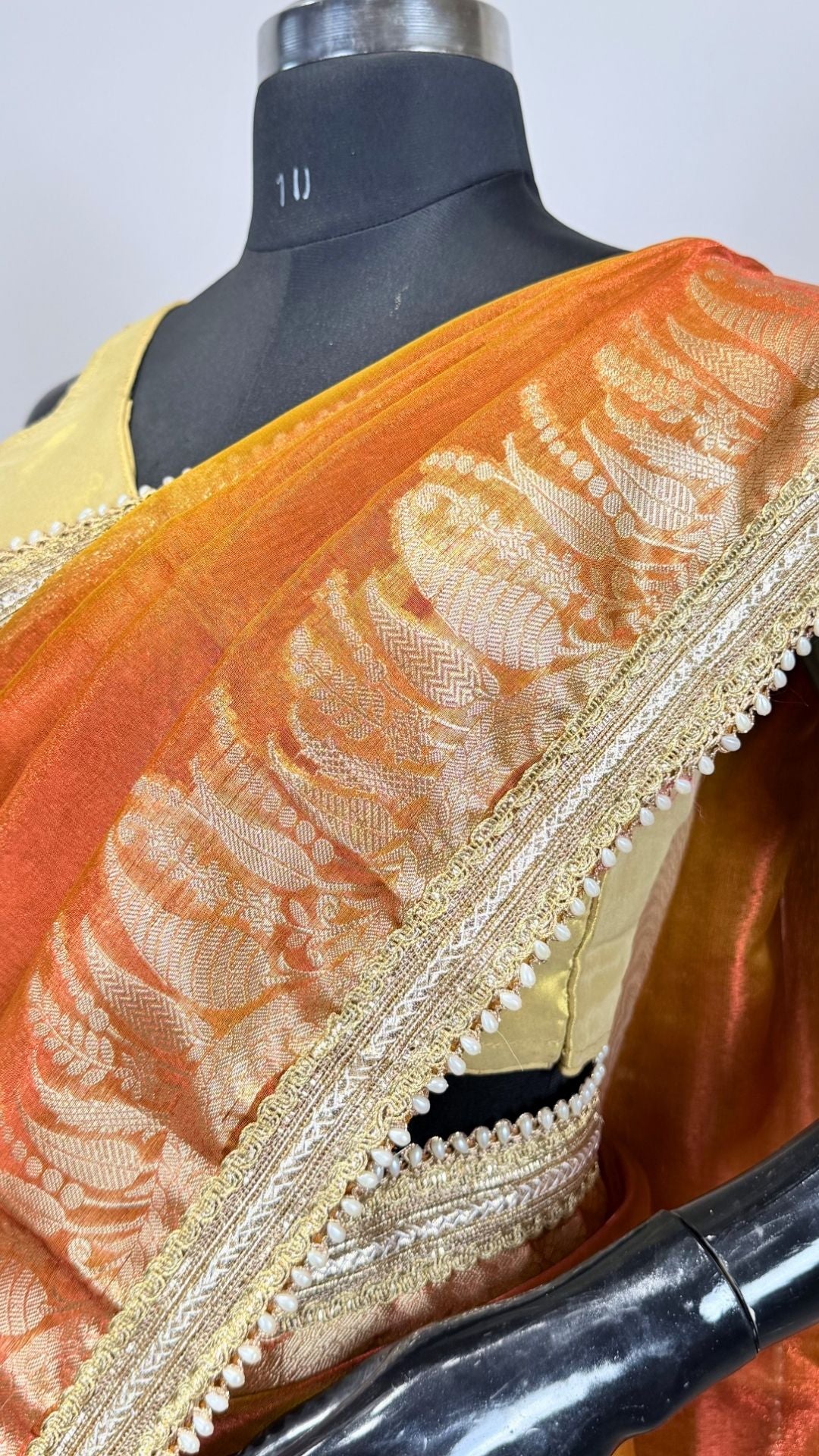 Orange Tissue Saree with Rich Zari Border & Moti Lace