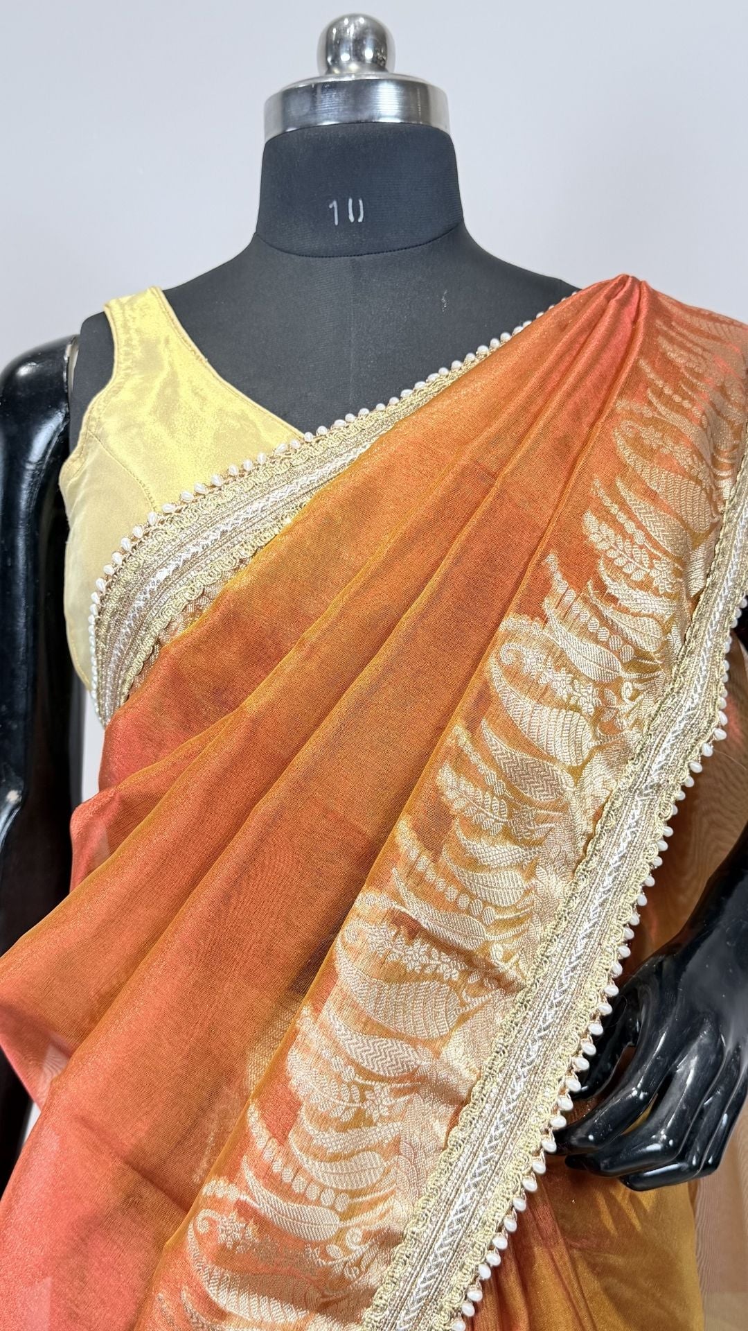 Orange Tissue Saree with Rich Zari Border & Moti Lace