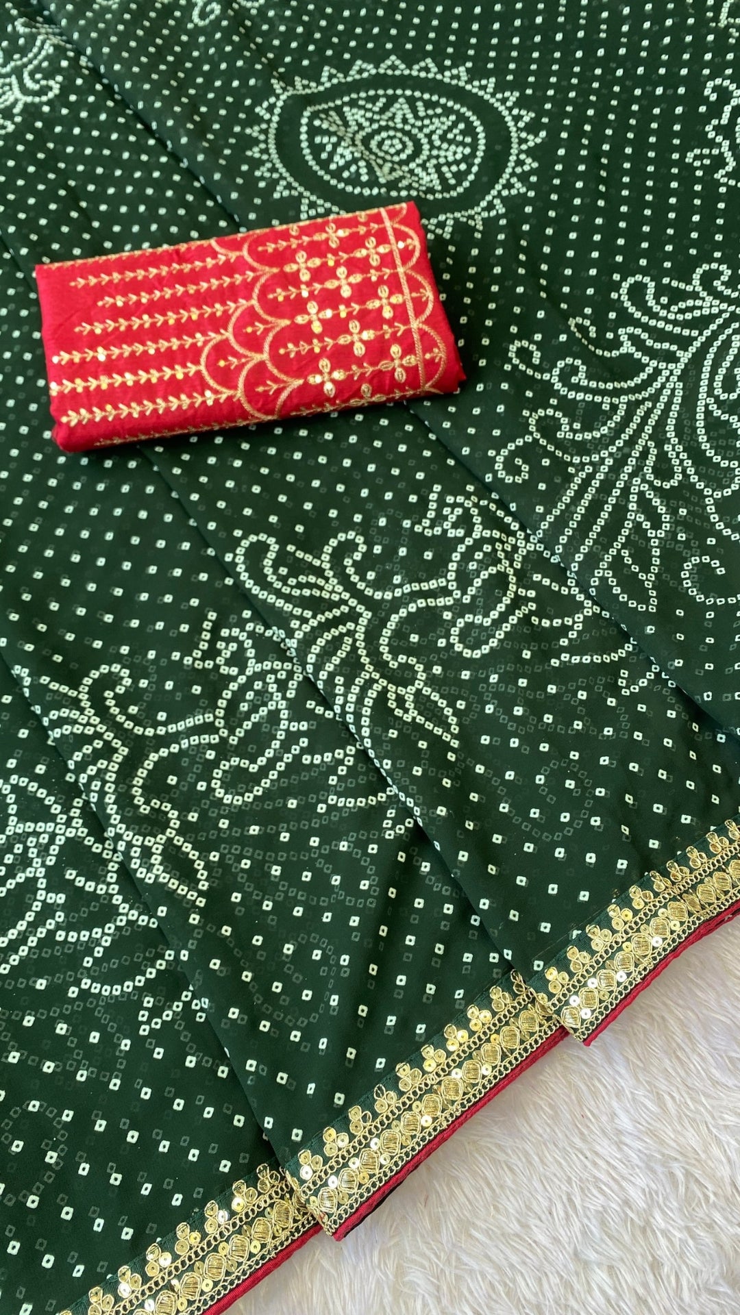 Green Georgette Bandhani Saree With Red Contrast Blouse