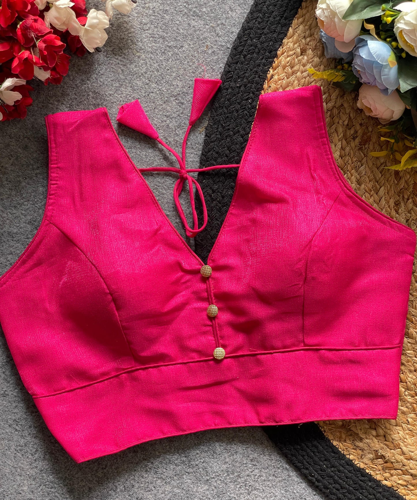 Readymade Sleeveless Blouse with Deep Neckline & Decorative Buttons