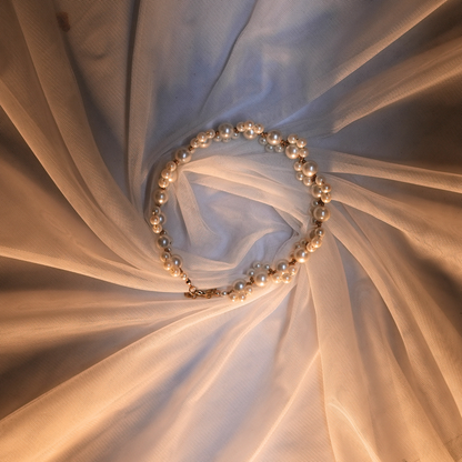 Serpent Elegance Bracelet – White & Golden Pearl Design