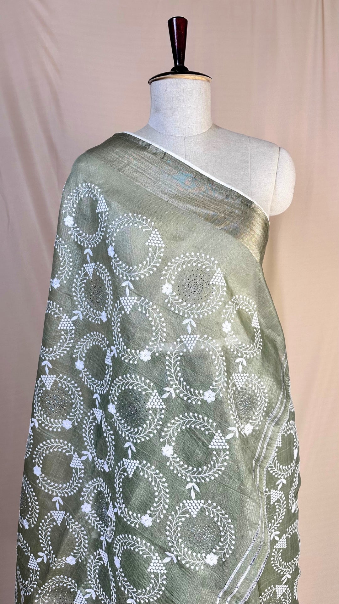 Elegant pista green tissue Saree with Embroidery border& Floral Motifs