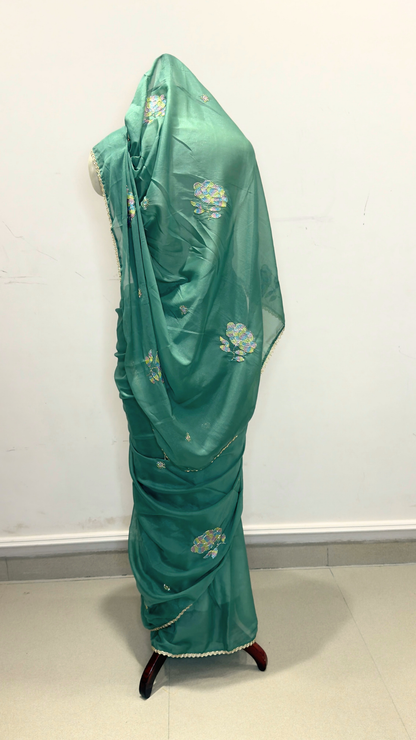 Banarashe Green Embroidered Saree with Multicolour Floral Motifs & Delicate Gold Lace Border