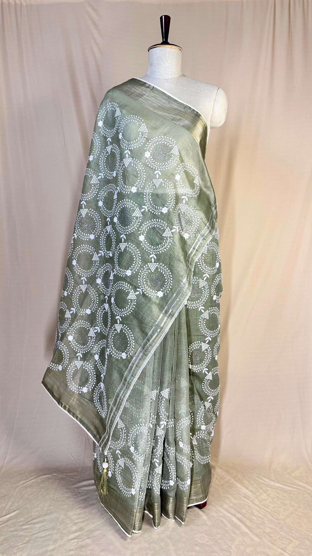 Elegant pista green tissue Saree with Embroidery border& Floral Motifs