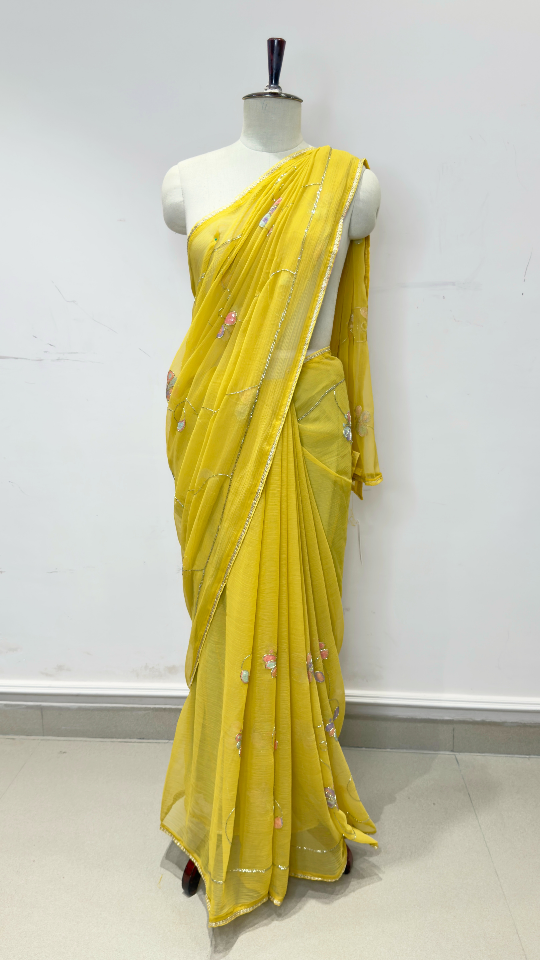 Banarashe Mustard Yellow Embroidered Saree with Multicolour Floral Motifs & Silver Lace Border