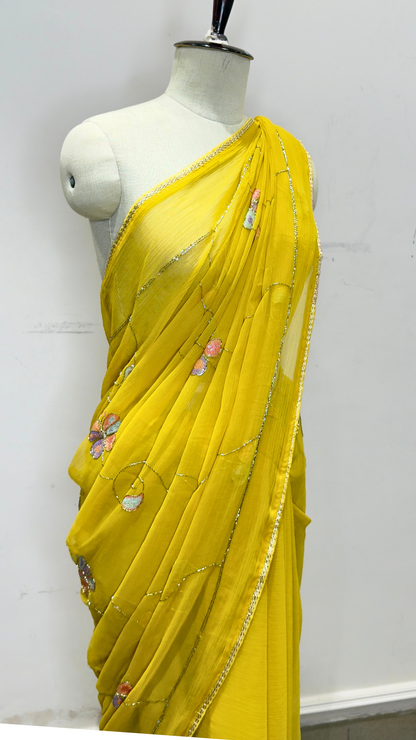 Banarashe Mustard Yellow Embroidered Saree with Multicolour Floral Motifs & Silver Lace Border