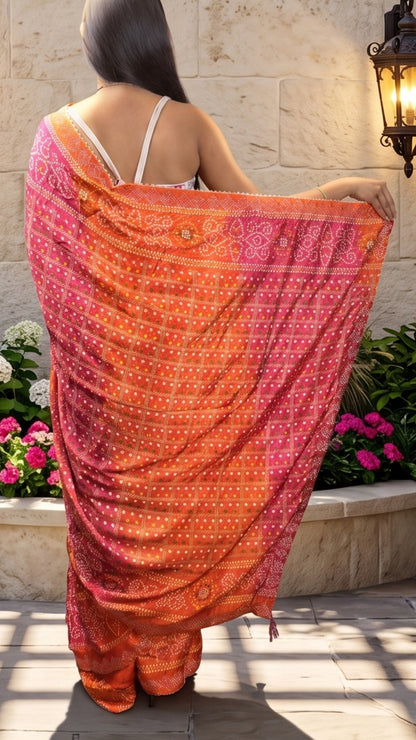 The Radiant Orange & Pink Bandhani Saree by Banarashe