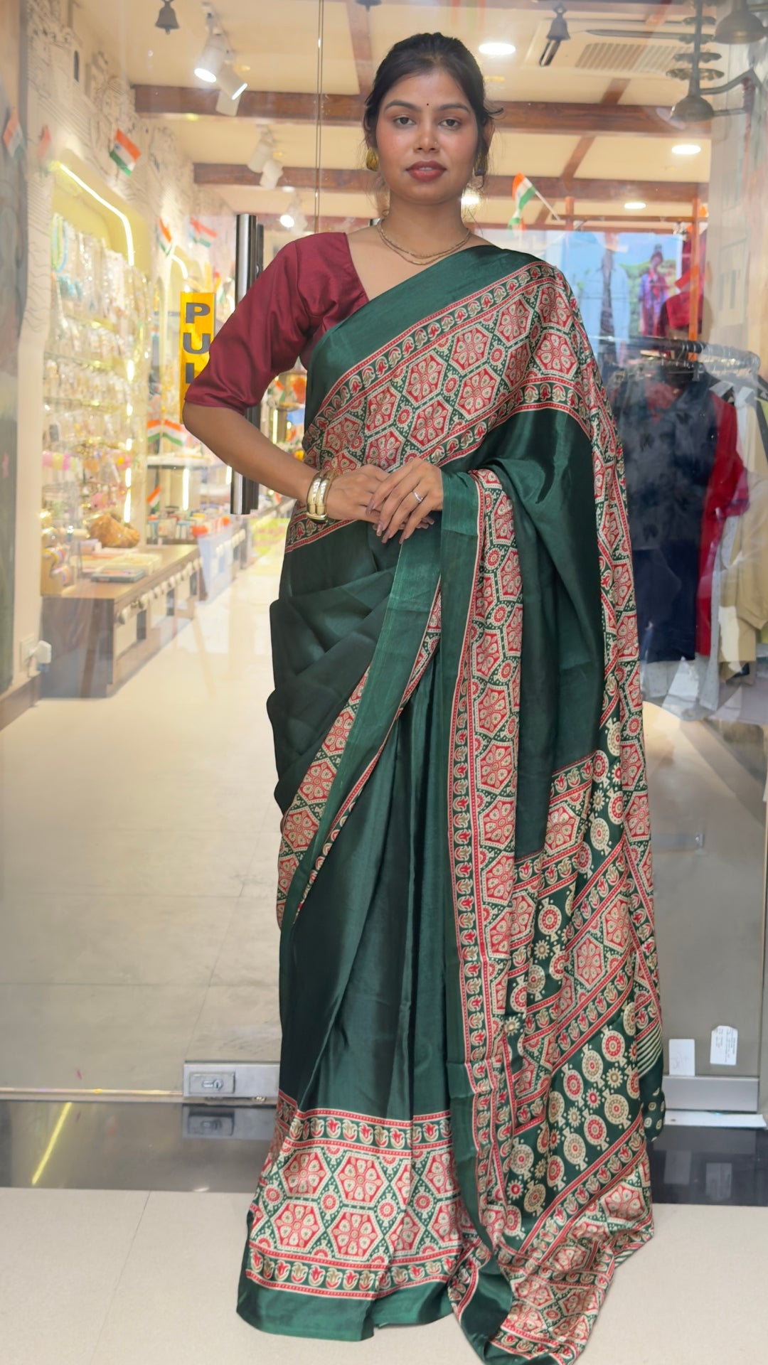 Elegant Dark Green Printed Silk Saree with Traditional Border