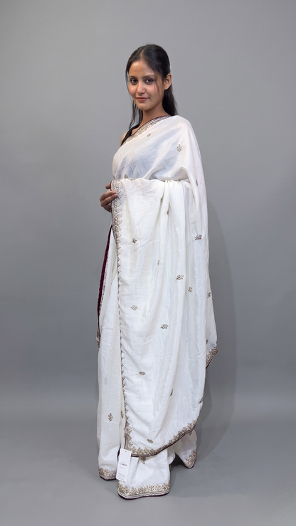 Banarashe Elegant White Georgette Saree with Delicate Zari Border