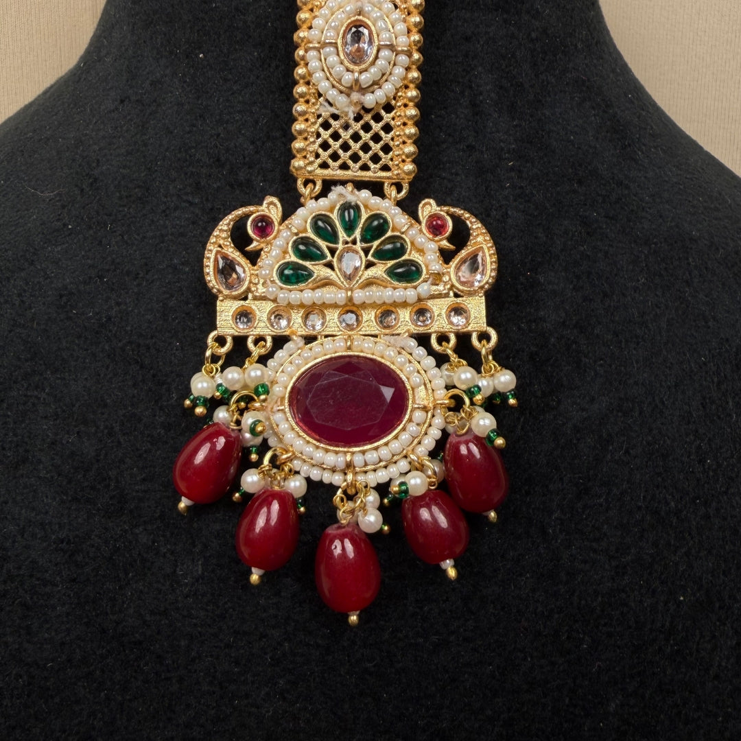 Gold Plated Peacock Jhumka Earrings – Red & Green Stones