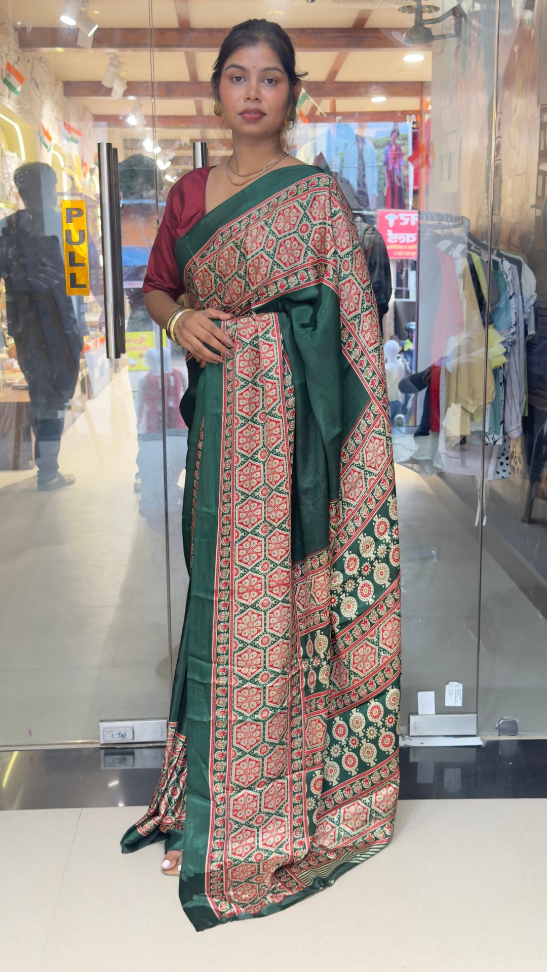 Elegant Dark Green Printed Silk Saree with Traditional Border
